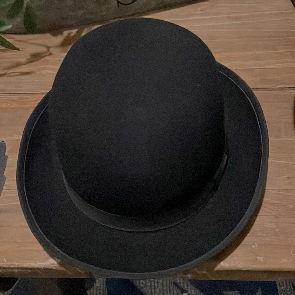 Black bowler size medium 100% wool.